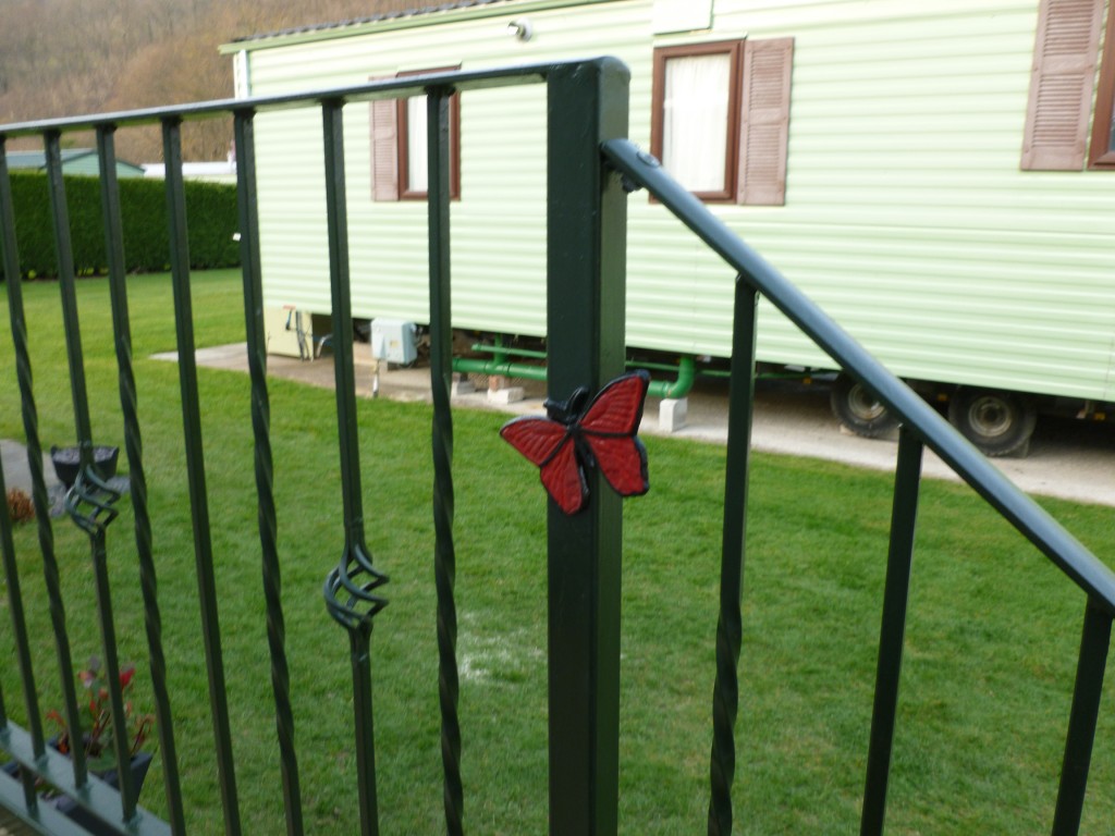 Butterfly Detail on Wrought Iron Caravan Balconies