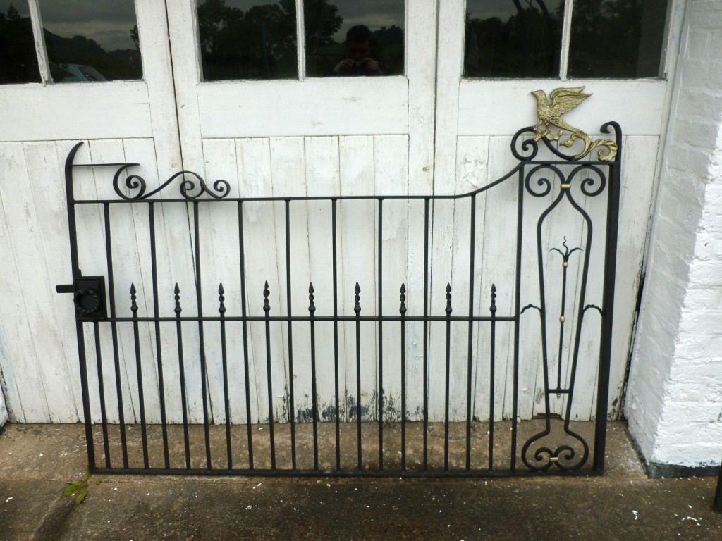 Ornate Wrought Iron Gates with Bird Design